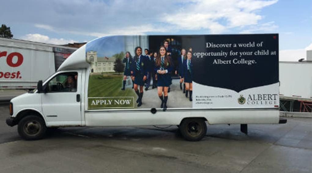 Truckside Advertisement photo of Albert College showing casing some kids heading into school