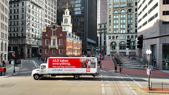 Truckside Advertisement for ALS Association in a busy intersection