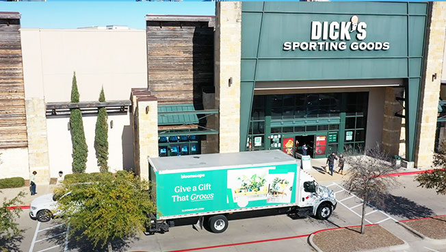 Truckside Advertisement photo of Bloomscape doing a targeted residential OOH advertising campaign