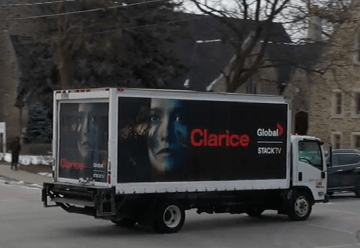 Mobile billboard advertisement for Corus on side of truck