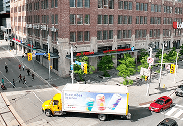 Mobile billboard advertisement for Daydream on side of truck