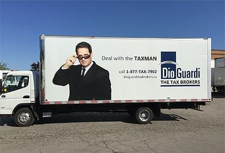 Parked Truck Advertising with ad for Dioguardi, The Tax Brokers.