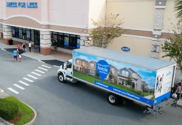 Mobile billboard advertisement for lennar's on side of truck