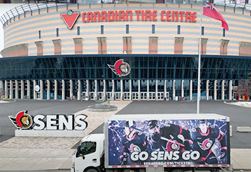 Mobile billboard advertisement for Ottawa Senators on side of truck