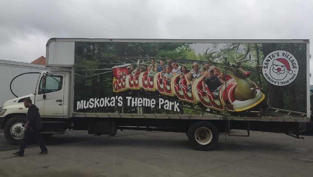 Truckside Advertisements for Santa’s Village a Muskoka Theme Park showcasing a roller coaster ride