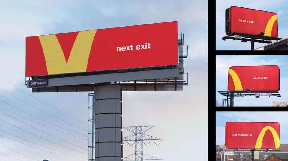 Image of various McDonald's billboard ads that tell you where the next McDonald's is. The biggest billboard says "next exit". 
