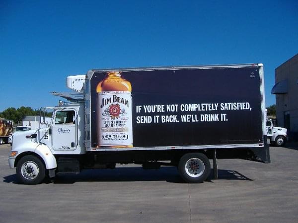Truckside ads promote both business and consumer interest