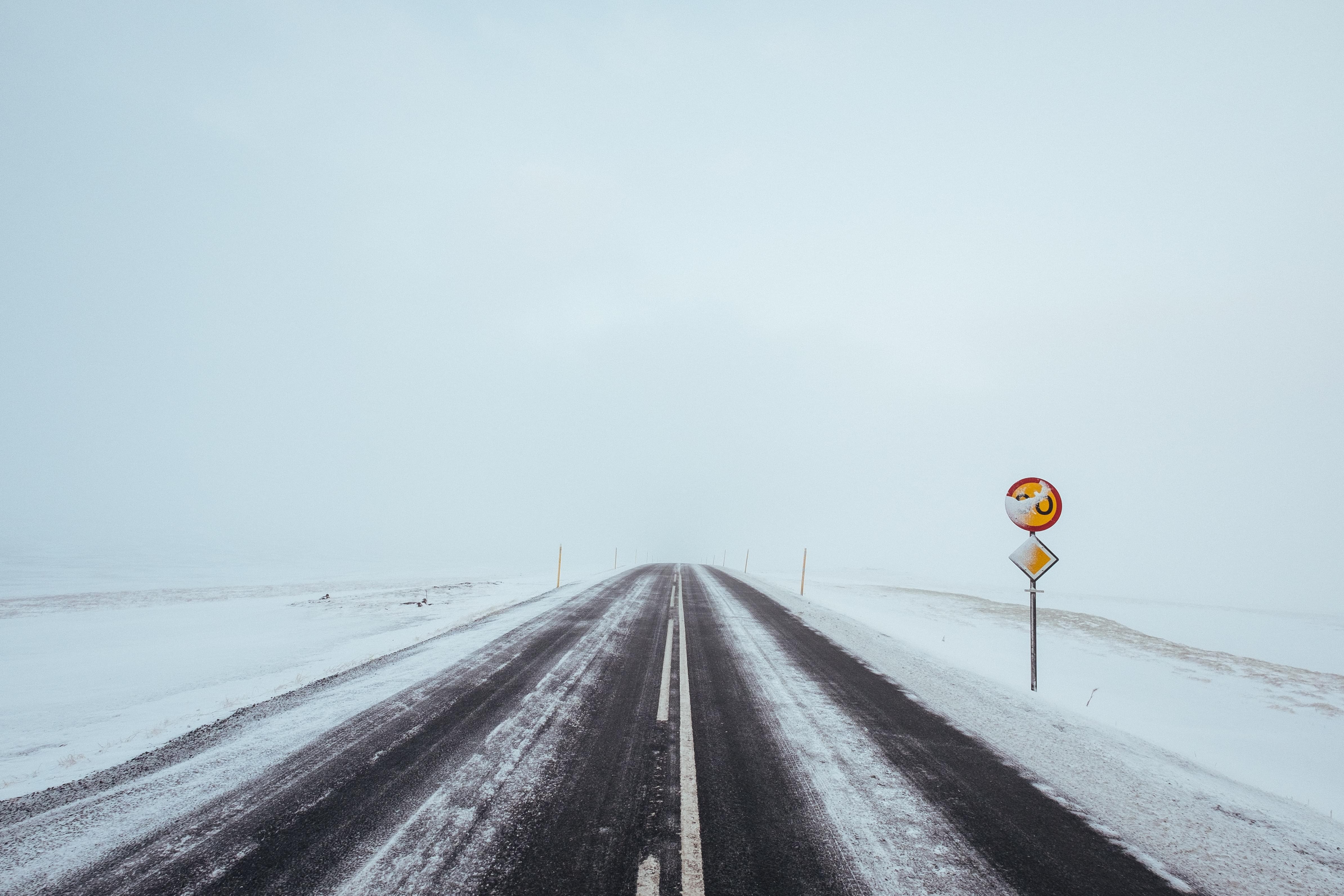 An empty road during wintertime by Robert Bye (UnSplash)