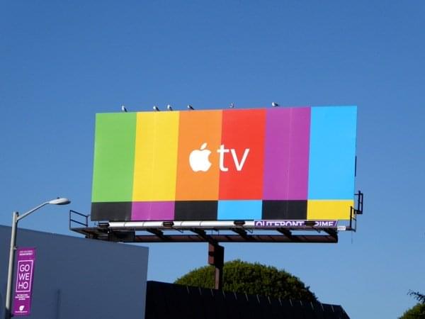 Apple TV advertising their service on a large billboard