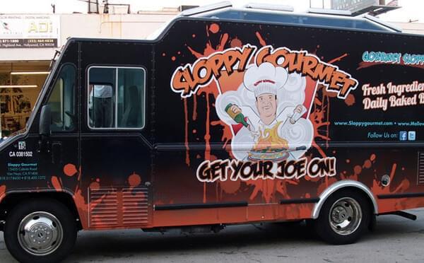 This food truck wrap is immediately attention-grabbing with the color palette and the artful mascot
