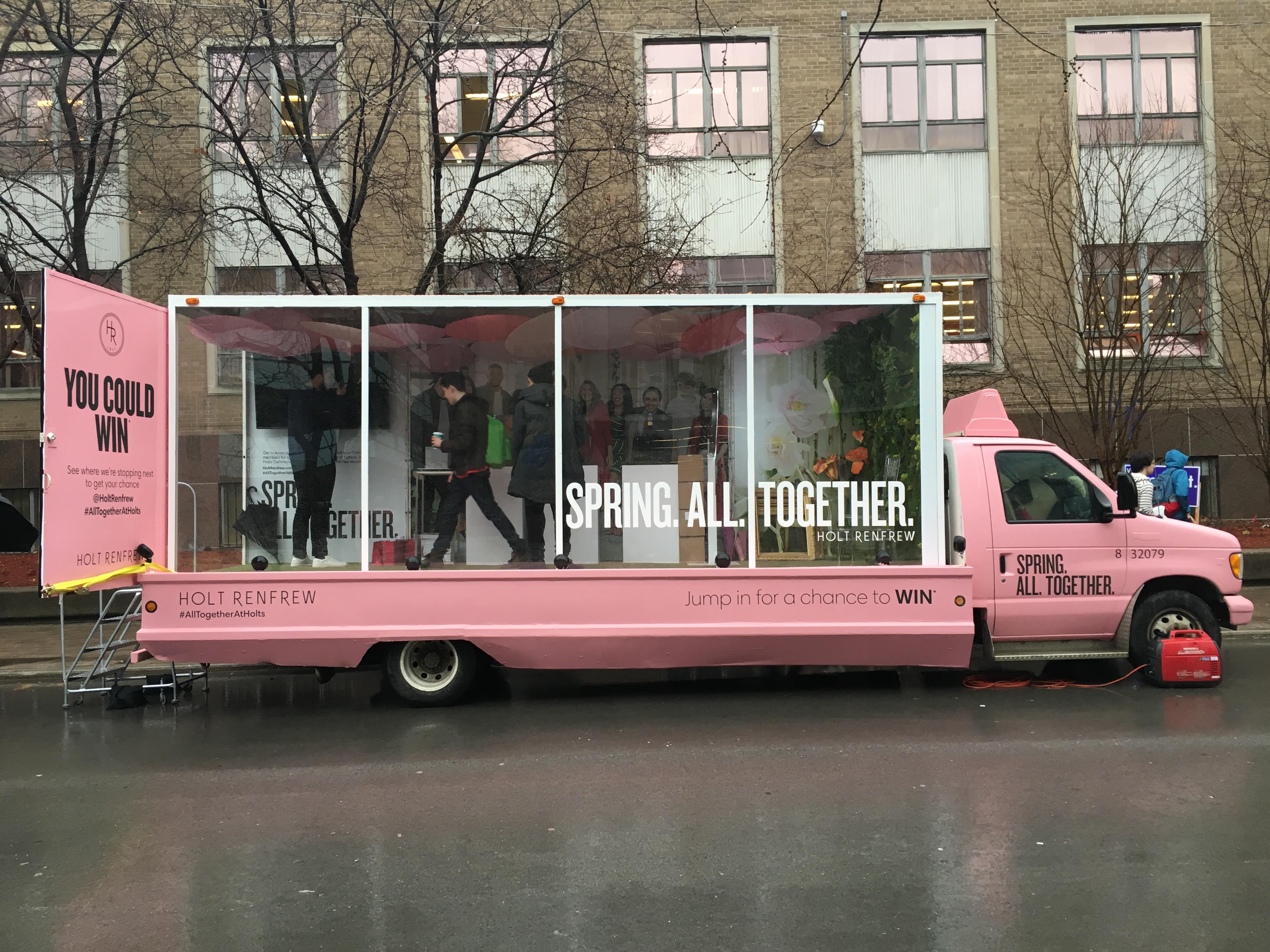 A guerilla mobile billboard communicates with consumers in an interactive fashion