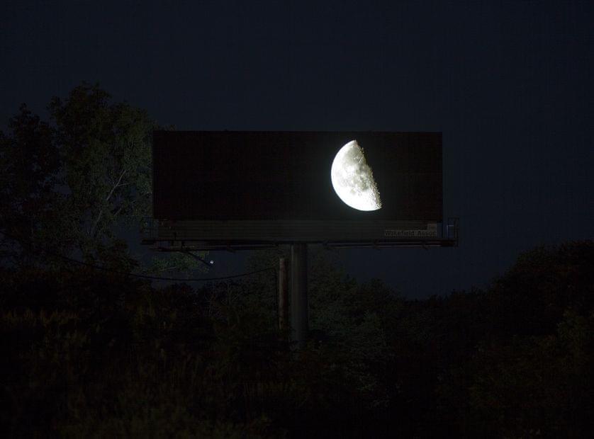 An art installation on a billboard meets the beauty of the earth