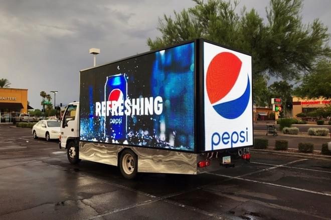 Digital mobile billboards combine current technology with traditional messaging