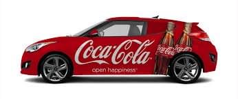 Image of a Wrapify car wrapped with a Coca-Cola ad