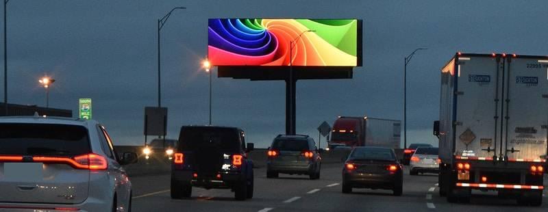 An Image of a distracting billboard at Night
