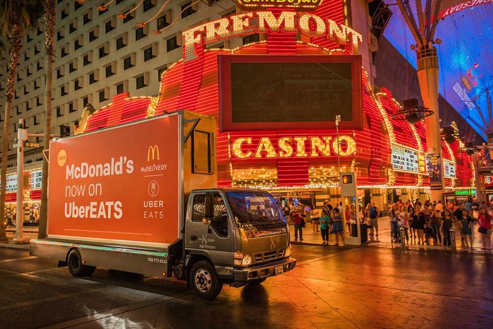McDonald's on UberEats drives through the strip advertising this convenient service