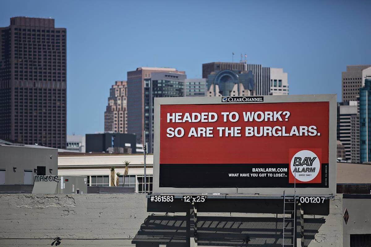 Effective billboard for Bay Alarm in San Francisco alerting drivers of their service