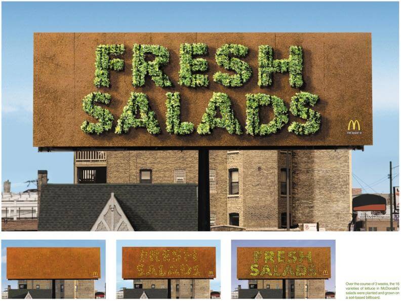 4 different images of a real-life billboard grown from lettuce heads. The text spells out 'Fresh Salads' and is made by McDonald's.