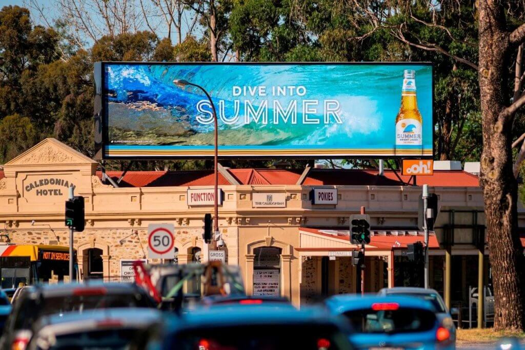 An image of a billboard ad for beer.