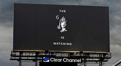 An image of a billboard ad for Drake's album.