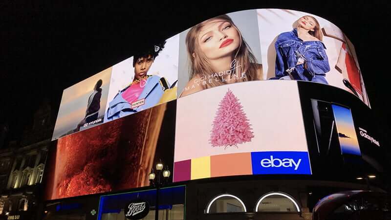 An image of an array of DOOH ads for different things, but mostly for fashion and makeup.