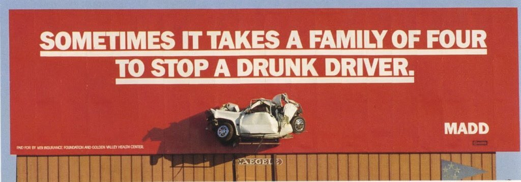 "A powerful image of a car crashed with the text: 'Sometimes it takes a family of four to stop a drunk driver".