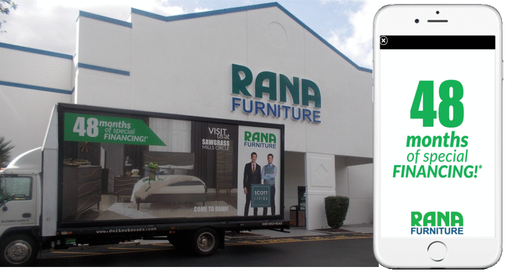 An image of a truck-side ad for Rana Furniture with an image of a bedroom on it, placed in front of a Rana Furniture store.