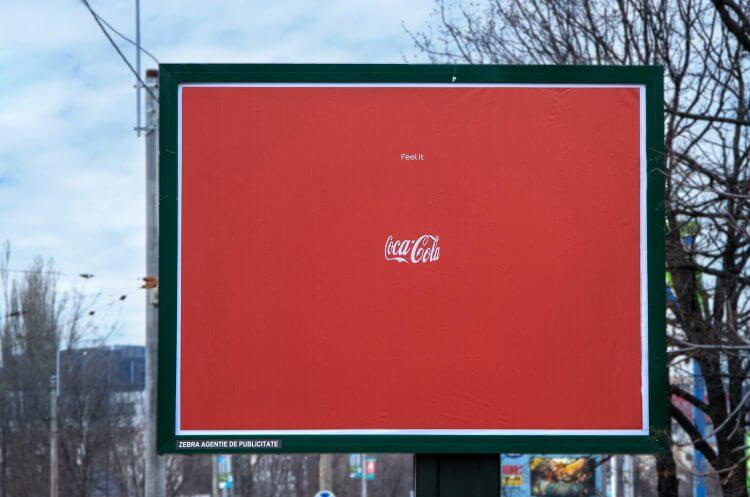 Coca-Cola OOH campaign creating an illusion of the bottle.