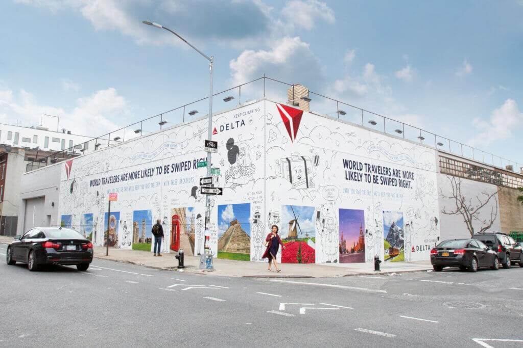Photo of Delta and Tinder's joint advertisement, 'The Dating Wall': a wall mural featuring nine of Delta's top direct destinations where people passing by are invited to take a new Tinder profile picture.
