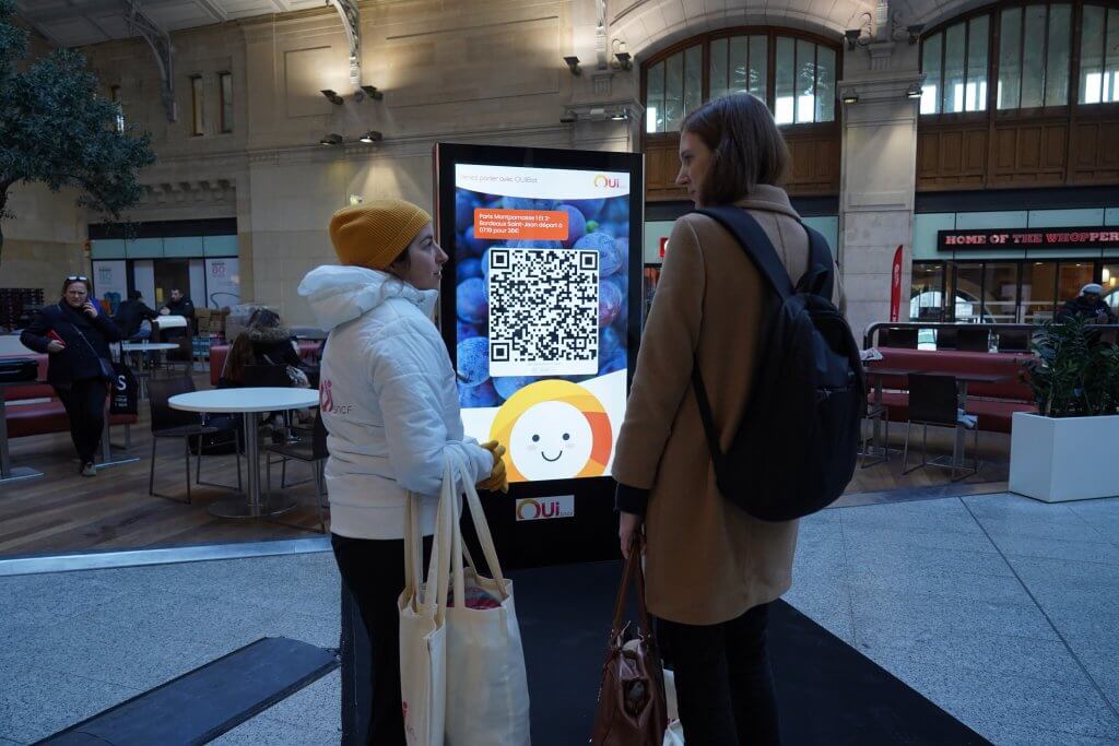 JCDecaux's OUIbot virtual assistant in train stations in Paris.