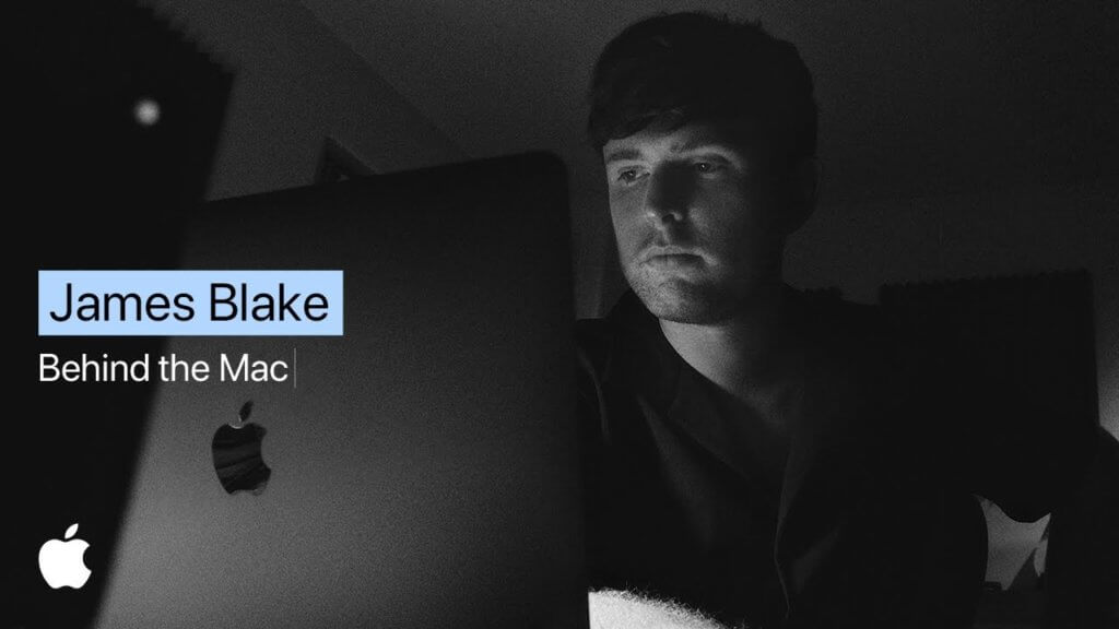 An image of an ad for Apple that has the artist James Blake staring at his Mac laptop.