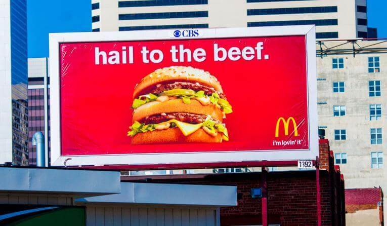 Mcdonald's billboard advertisement saying "hail to the beef"