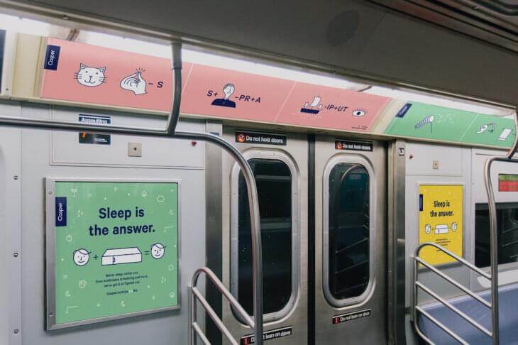 Photo of Casper's logical puzzle out-of-home advertisements promoting their mattresses in New York subway.