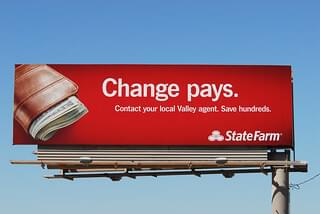 Picture of State Farm billboard ad. Ad reads, "Change pays. Contact your local Valley agent. Save hundreds."