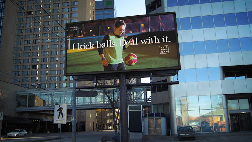 Sport England's campaign, "This Girl can" billboard of a girl playing soccer.