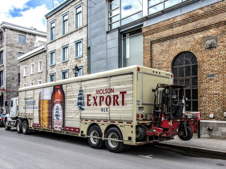 A Molson Export Ale truck side ad.